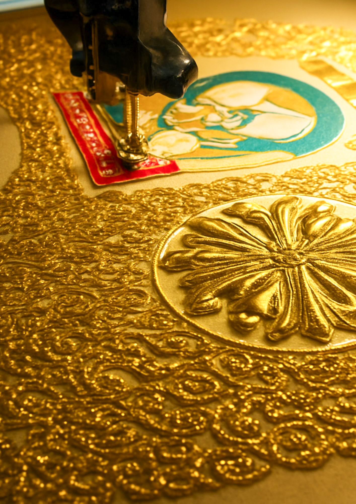 Goldwork embroidery technique, commonly used in traditional garments or ecclesiastical textiles.