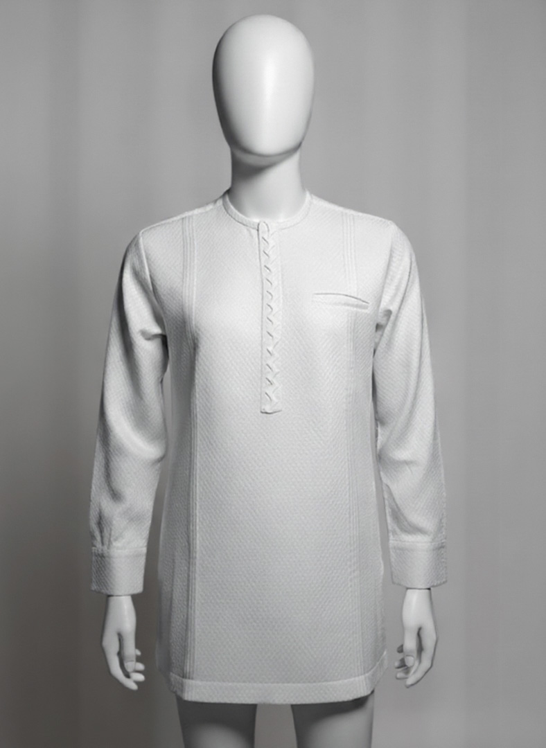 White Manyavar kurta features a distinct self-wave pattern and is typically sold in a set with matching pyjamas.