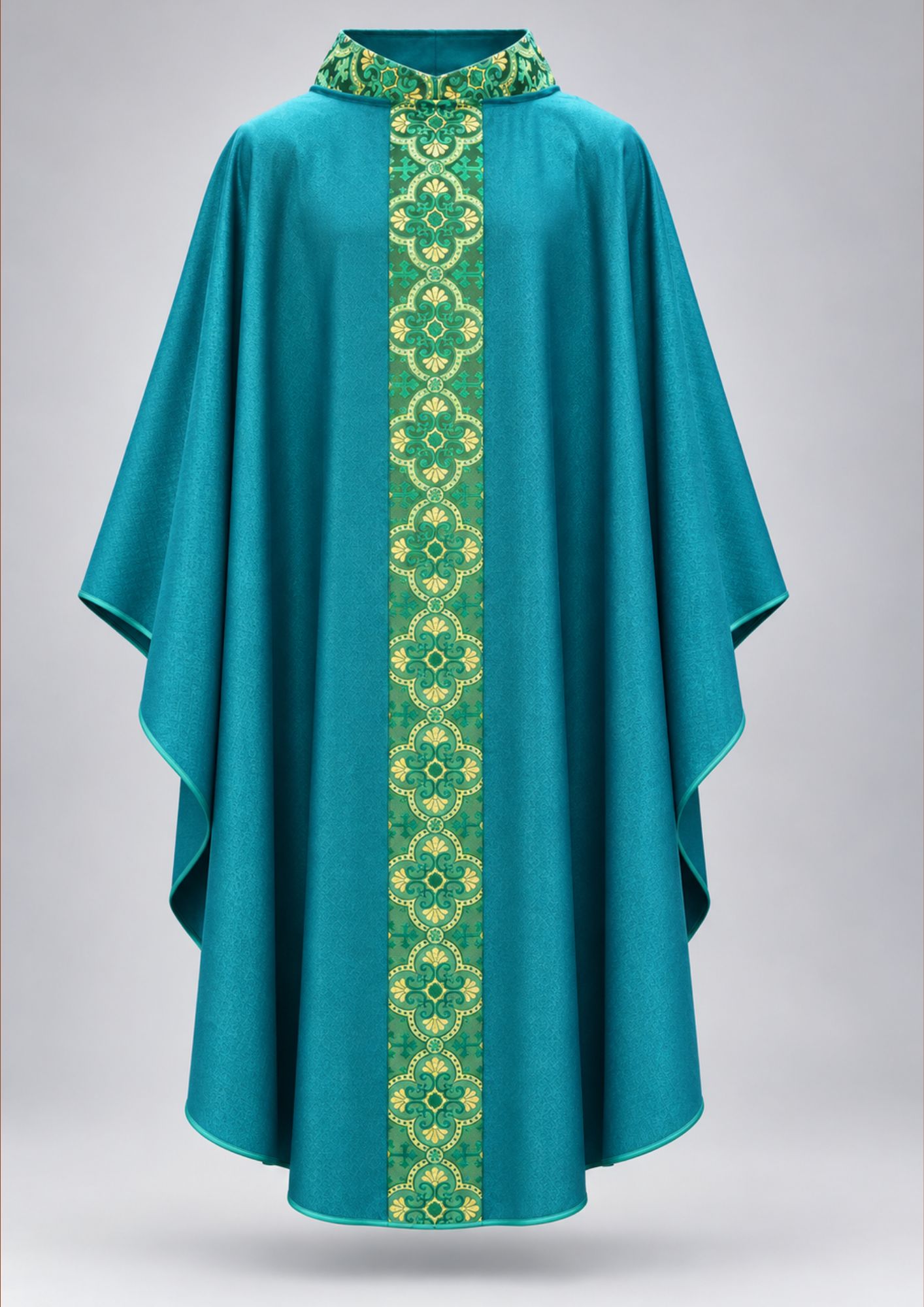 Teal liturgical chasuble featuring a distinctive green and gold patterned vertical orphrey band down the center.
