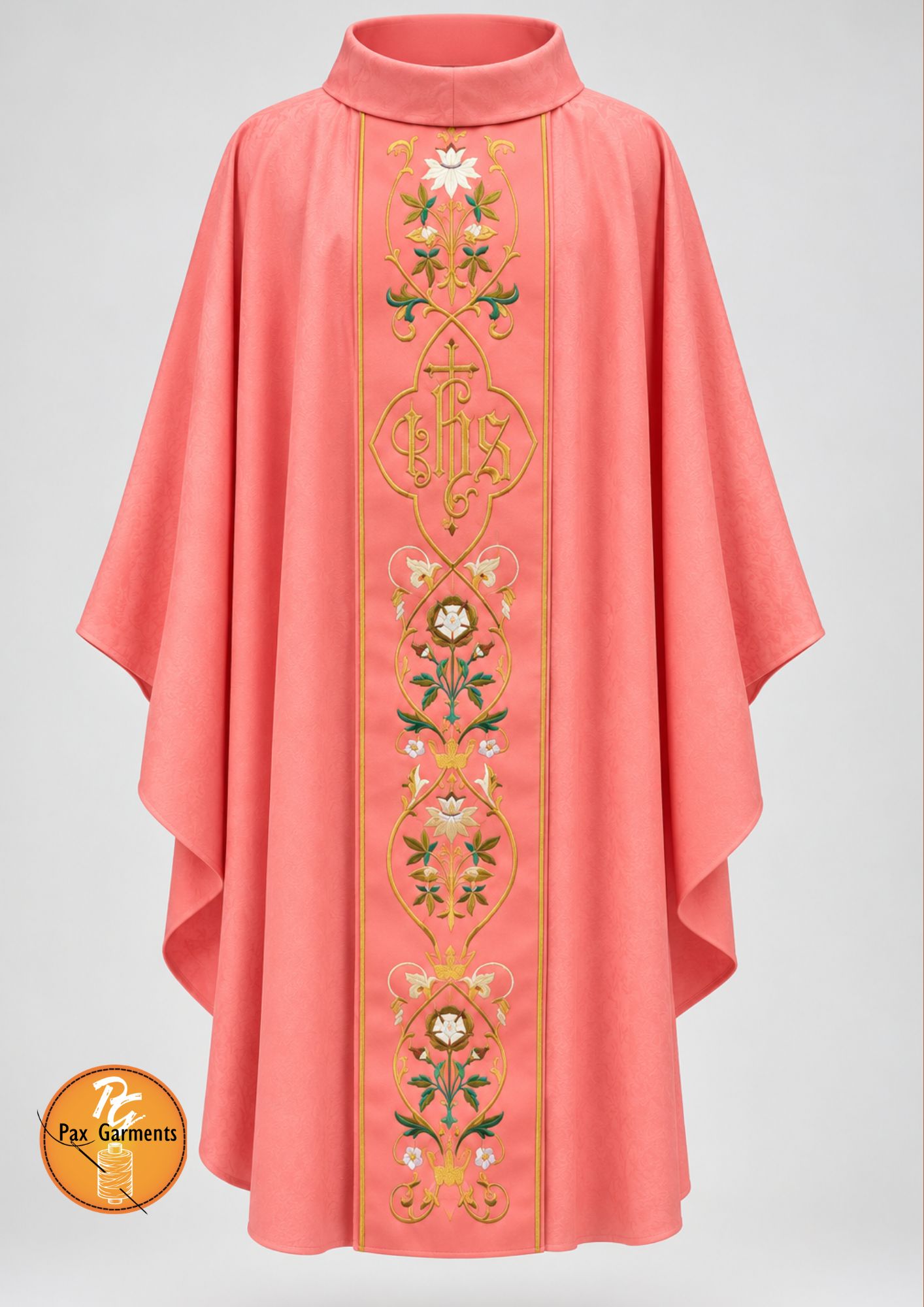 Rose pink liturgical chasuble featuring a central embroidered IHS monogram and delicate floral scrollwork down the front.